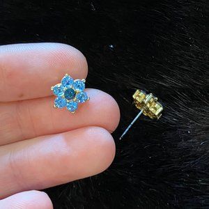 Flower post earrings with blue crystals